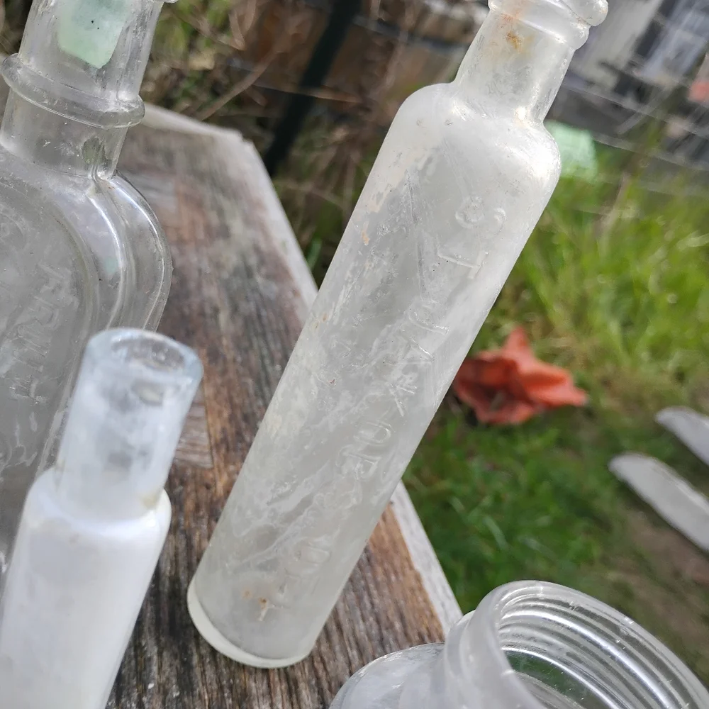 Collection of 8 vintage antique bottles